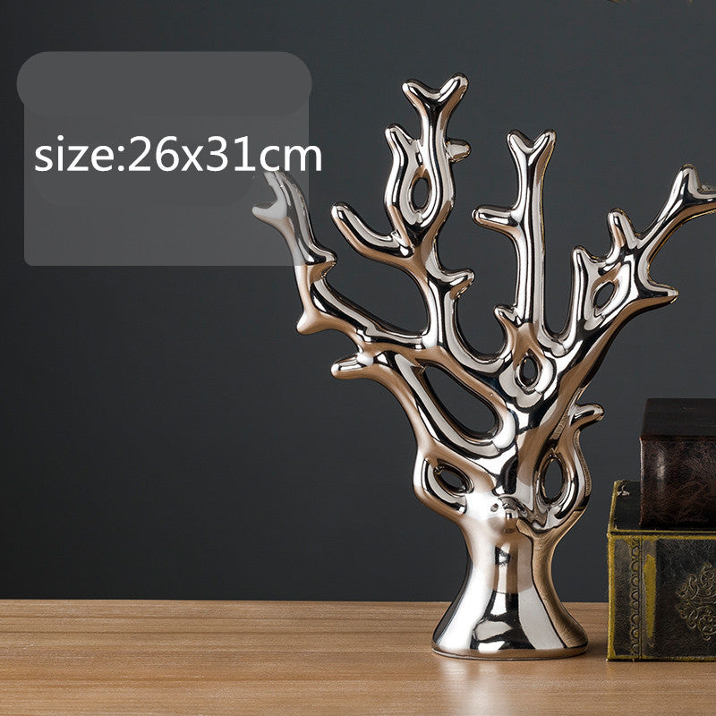 Maison's Luxe Gold Tree Sculpture