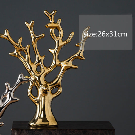 Maison's Luxe Gold Tree Sculpture