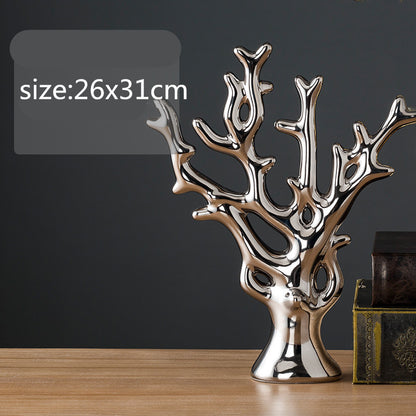 Maison's Luxe Gold Tree Sculpture
