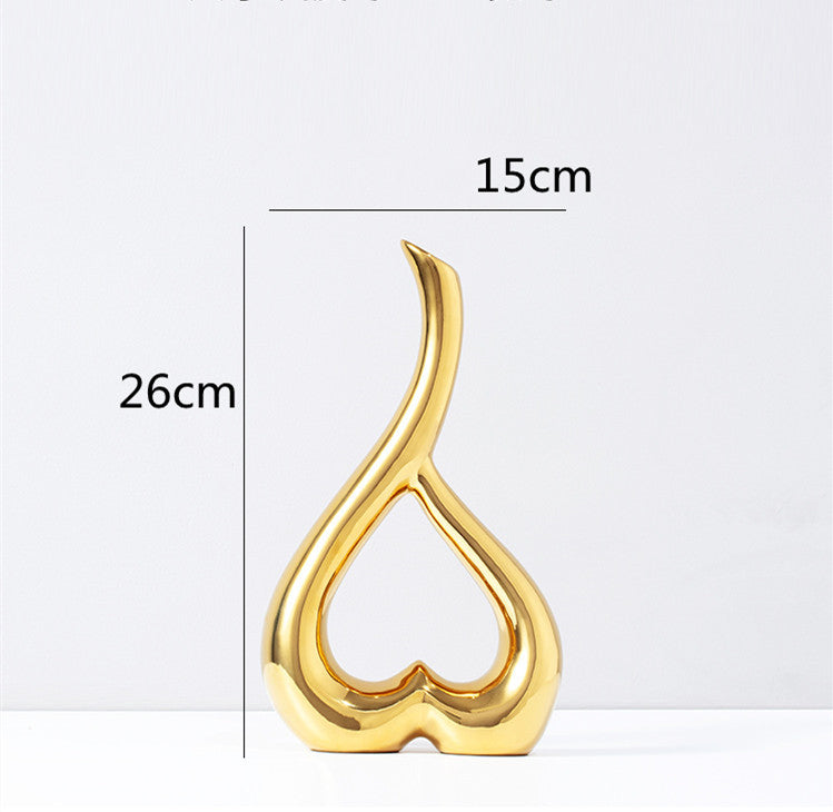 Maison's Luxe Gold Tree Sculpture