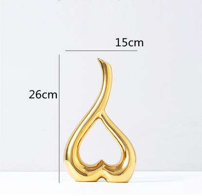 Maison's Luxe Gold Tree Sculpture
