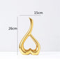 Maison's Luxe Gold Tree Sculpture