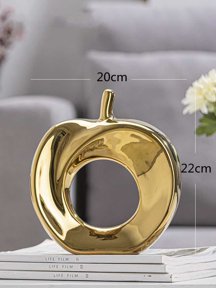 Maison's Luxe Gold Tree Sculpture