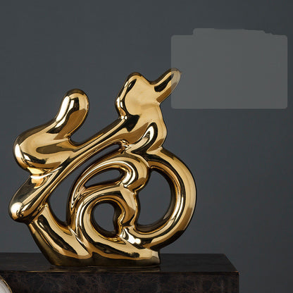 Maison's Luxe Gold Tree Sculpture
