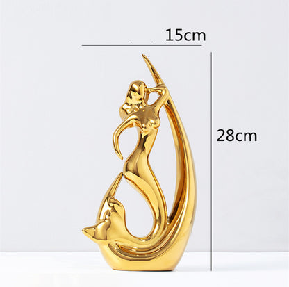 Maison's Luxe Gold Tree Sculpture