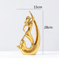 Maison's Luxe Gold Tree Sculpture